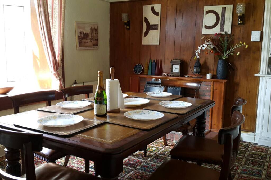 Large dinning room with antique furniture.