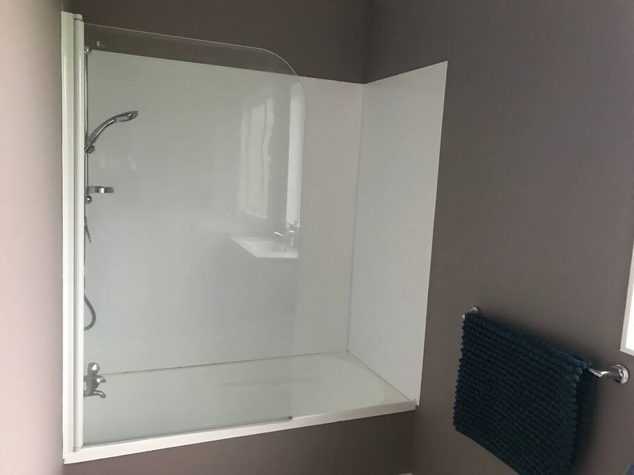 Not an ensuite but both bathroom and toilet directly across from the bedroom.