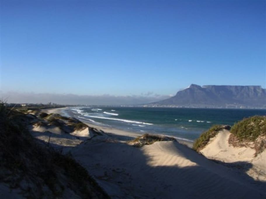 Early morning jog on the beach with world class views.