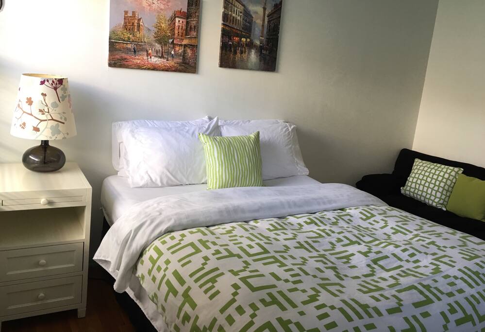 Queen size bed in private bedroom