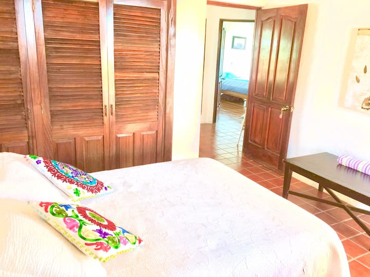 Guest Bedroom 3 with double bed, private balcony and shared bedroom on second floor