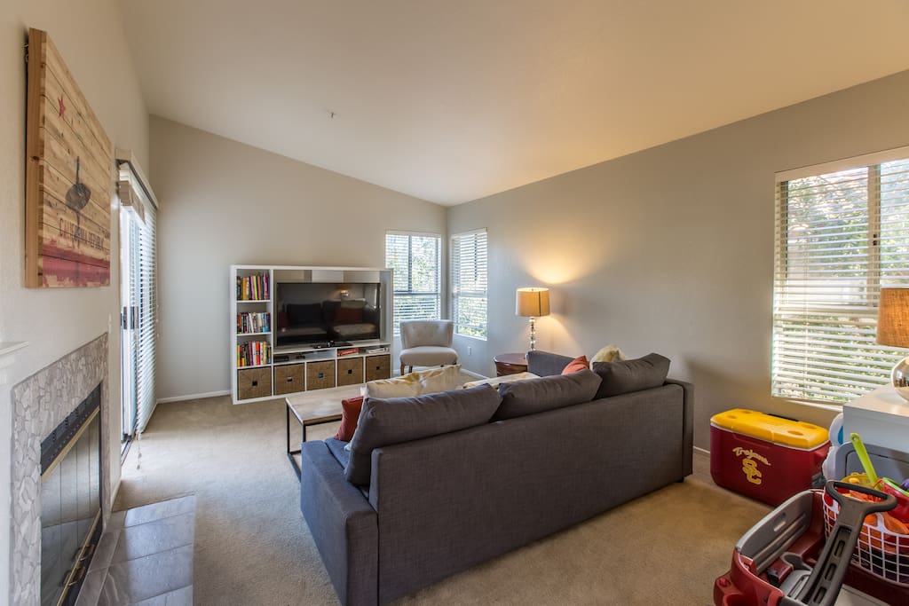 Comfportable and well appointed living room with massive 55" TV loaded with Netflix, Hulu plus and nearly 100 movies on Amazon Prime