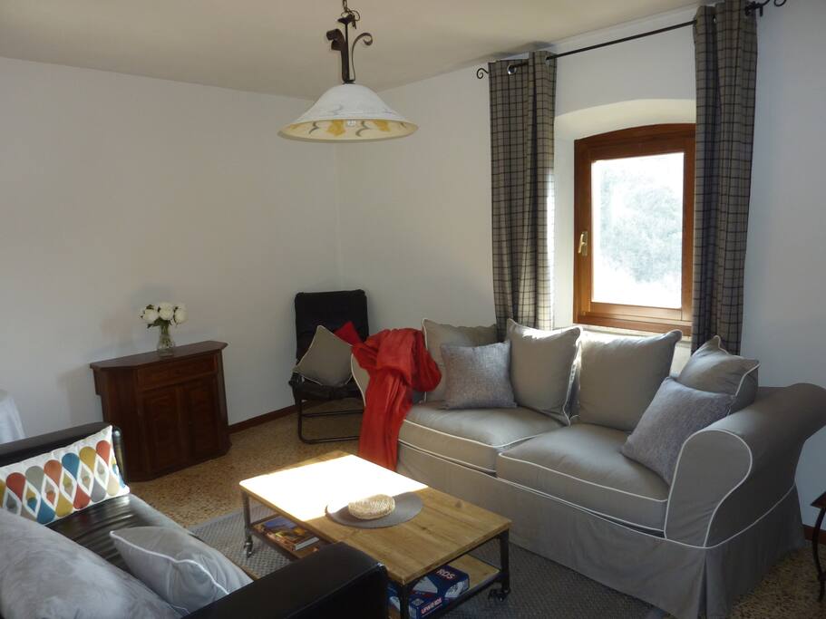 The comfortable upstairs lounge room has views of the river, valley and neighbouring hilltop villages