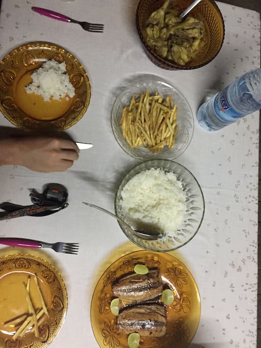 Dinner for two includes chicken, fish, rish and Vegetables (vegetable were still cooking)