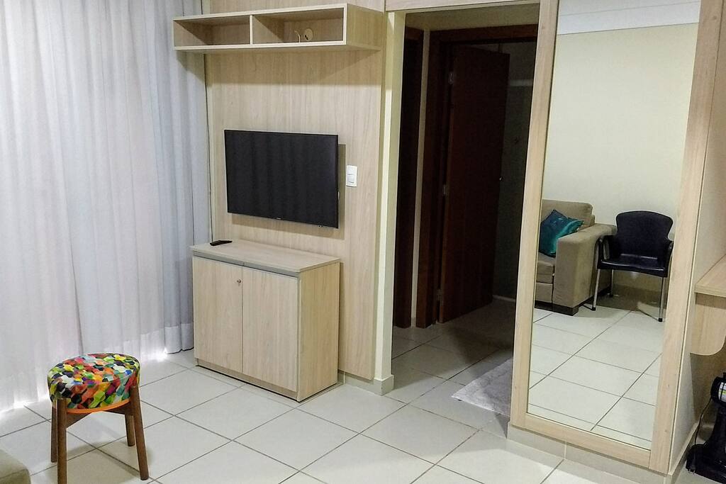Sala com sofá cama.
