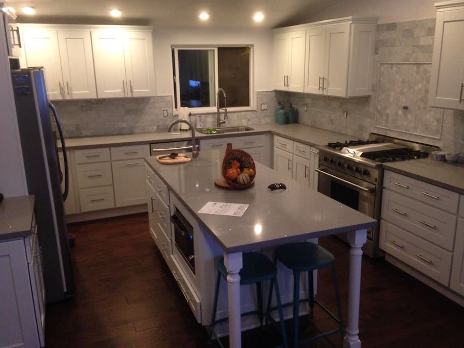 Beautiful chefs kitchen with eat in breakfast bar.