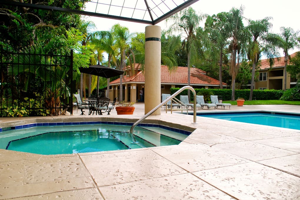 Pool area with hot tube in the community.