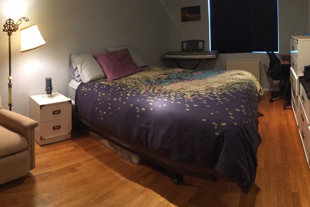 This bedroom is the larger one, and features some great black out shades, a piano for the musically inclined and a recliner for your lounging pleasure.