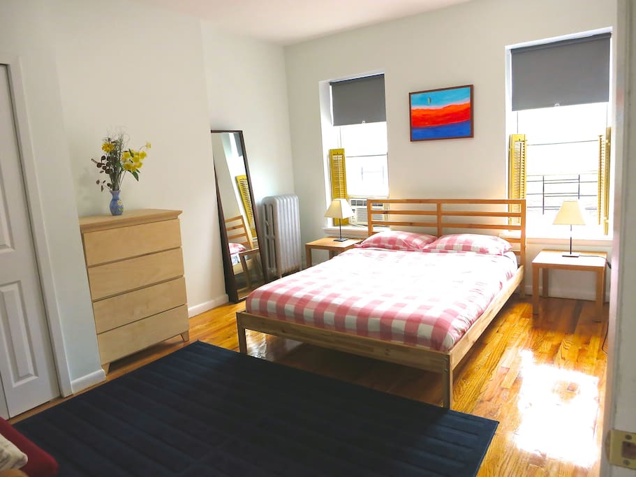 large bedroom with queen sized bed