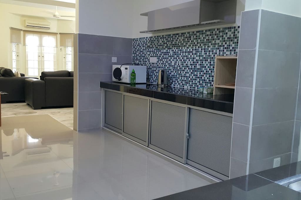 Newly Renovated kitchen. With microwave, electric water kettle & storage cabinet