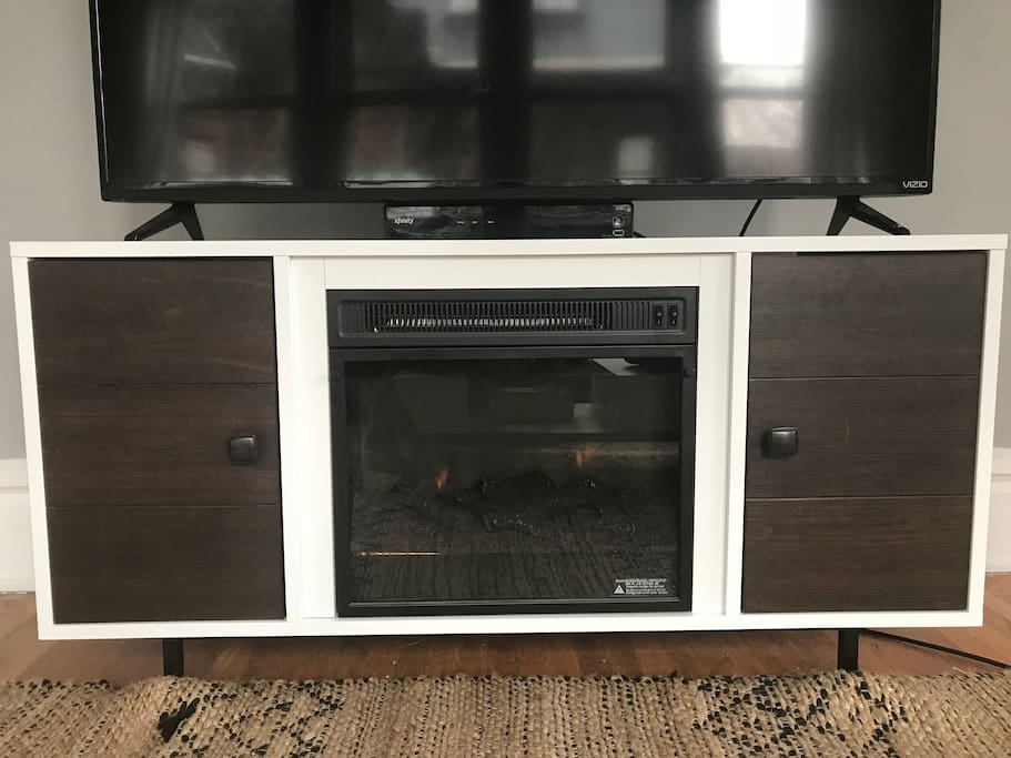 Fireplace in the media stand, for those extra cold nights