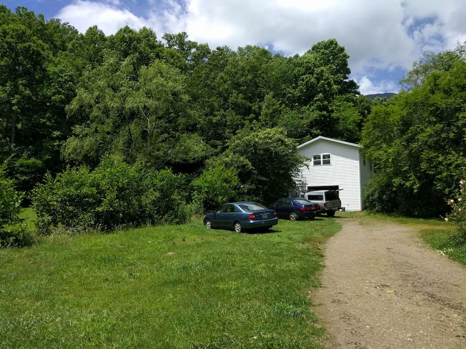 view of the studio from the driveway...summer lush!