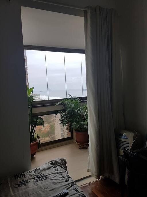 Quarto com vista pro mar