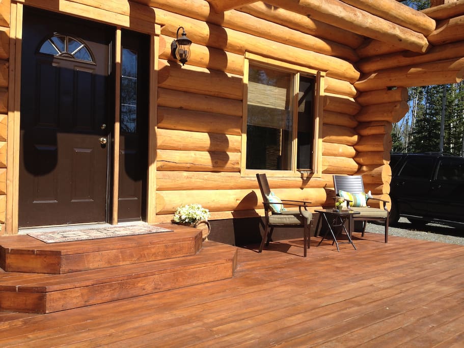 Spacious South facing deck with patio furniture and propane BBQ