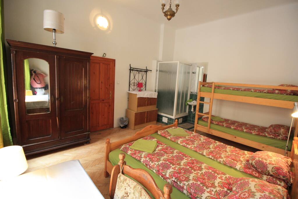 bedroom D8 , 4 beds ,writing desk, wardrobe, shower unit , ideal for couples