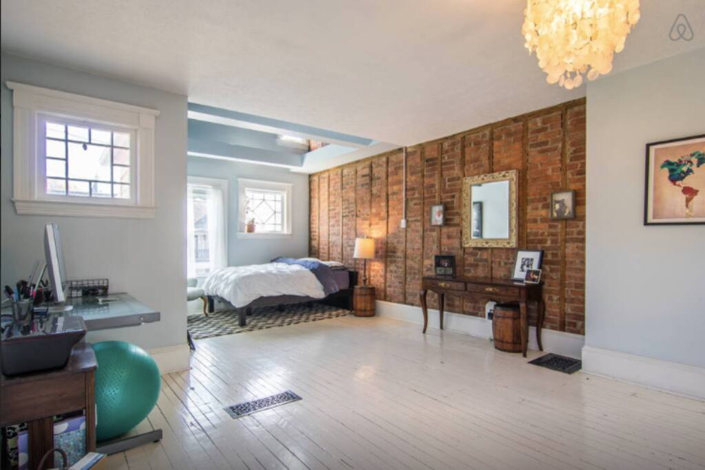 Exposed brick in bedroom