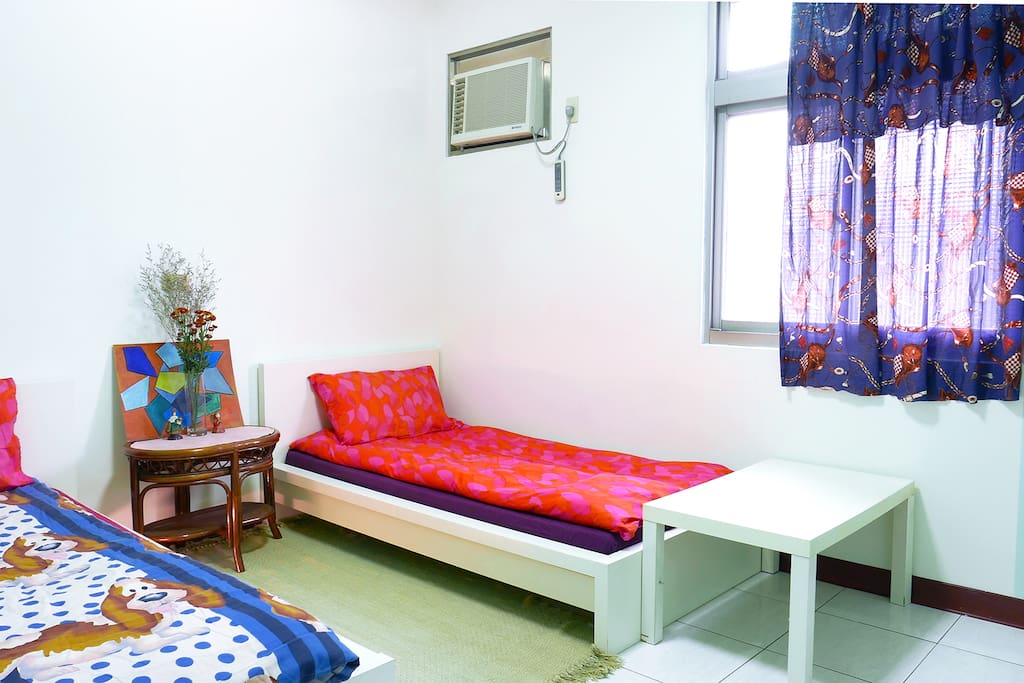 Two single-beds room for couple accommodation.