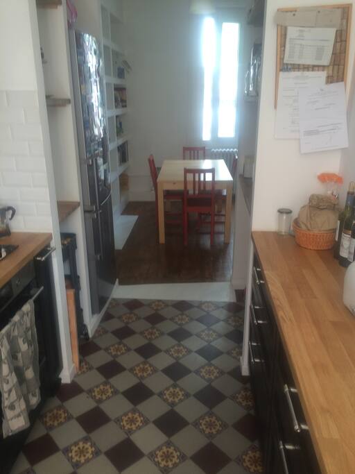 Kitchen with view toward the dining area.