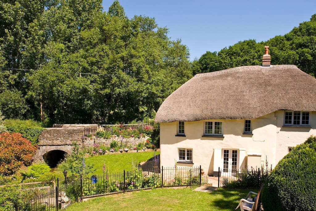 The beautiful garden and back view of cottage