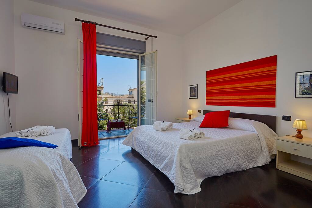 1^ Room: Double bed and a single bed (triple) with balcony