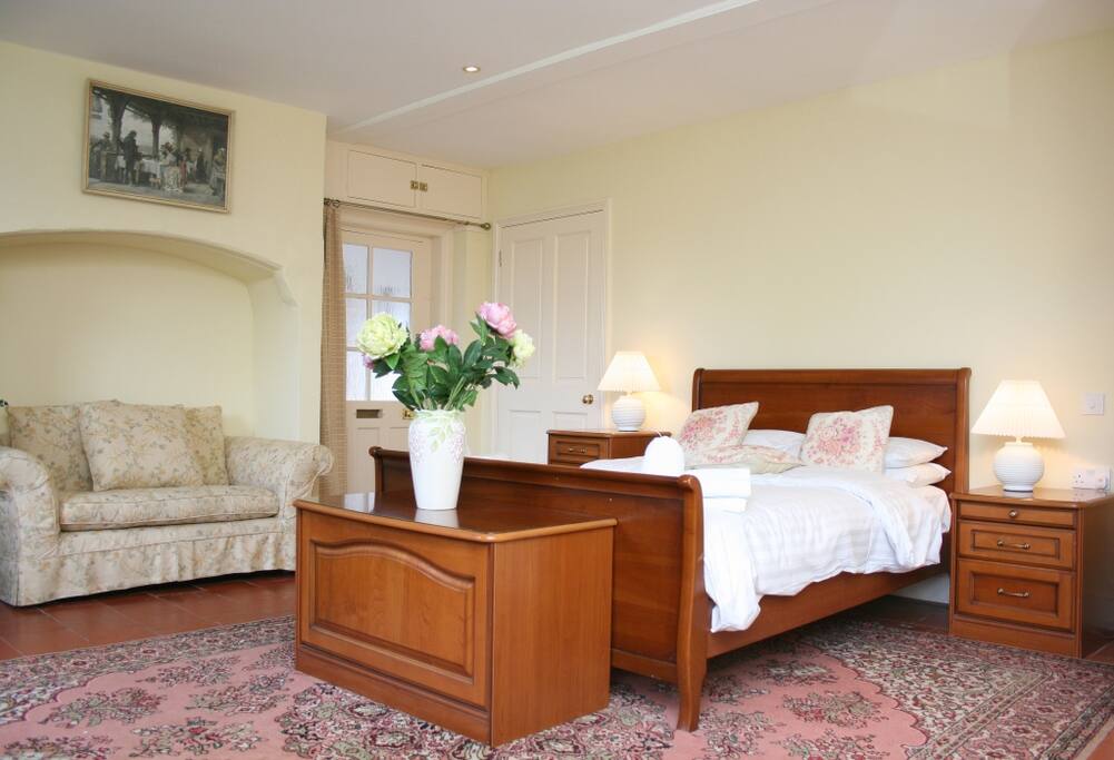Entrance, bed, sofa and door to en-suite, (to get in, sleep and wash)
