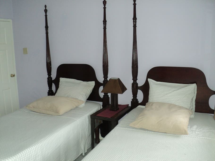 Single beds accommodate two