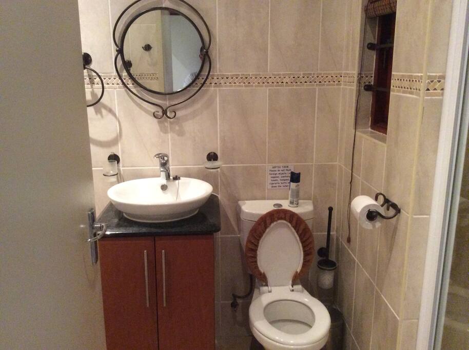 Bathroom includes bath and shower