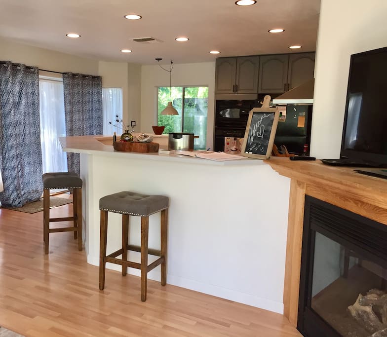 Wrap around bar in kitchen
TV and Fireplace