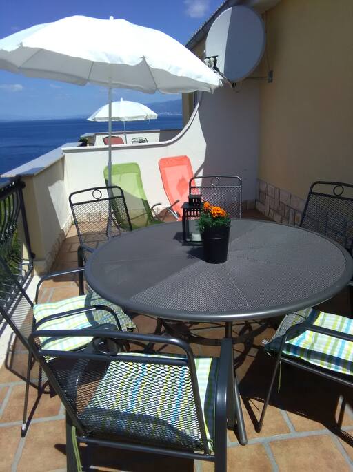 terasse with chairs,umbrella and table