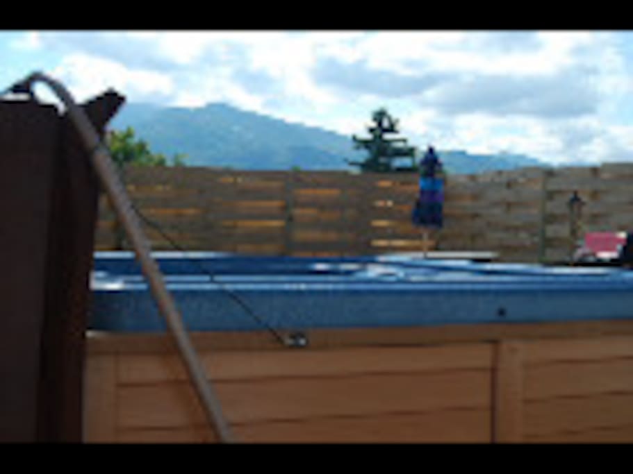 New hot tub and fenced in yard with amazing mountains views