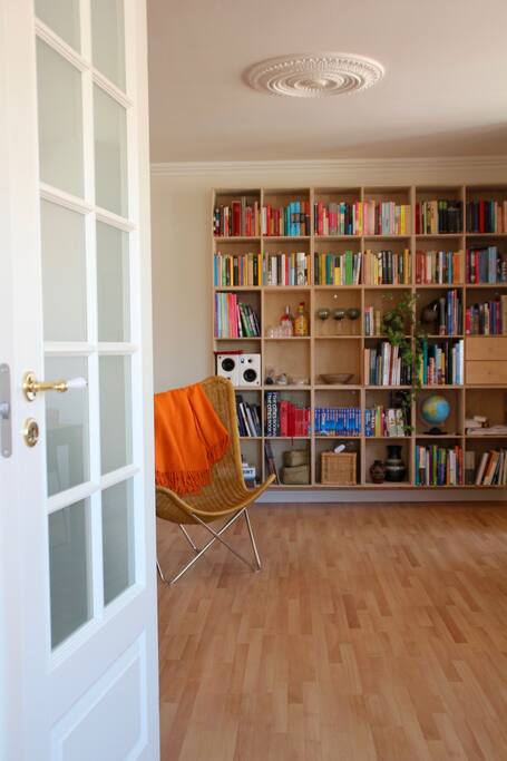 French doors separate living room from sleeping room