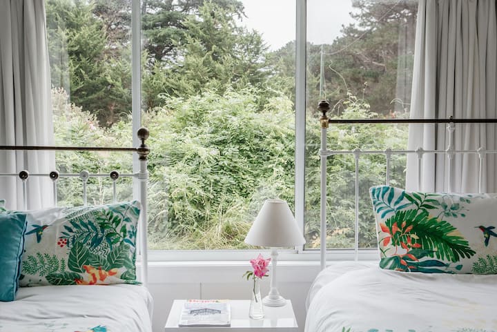 The interiors have been beautifully designed to create a welcoming and comfortable space for guests including fresh flowers and magazines.