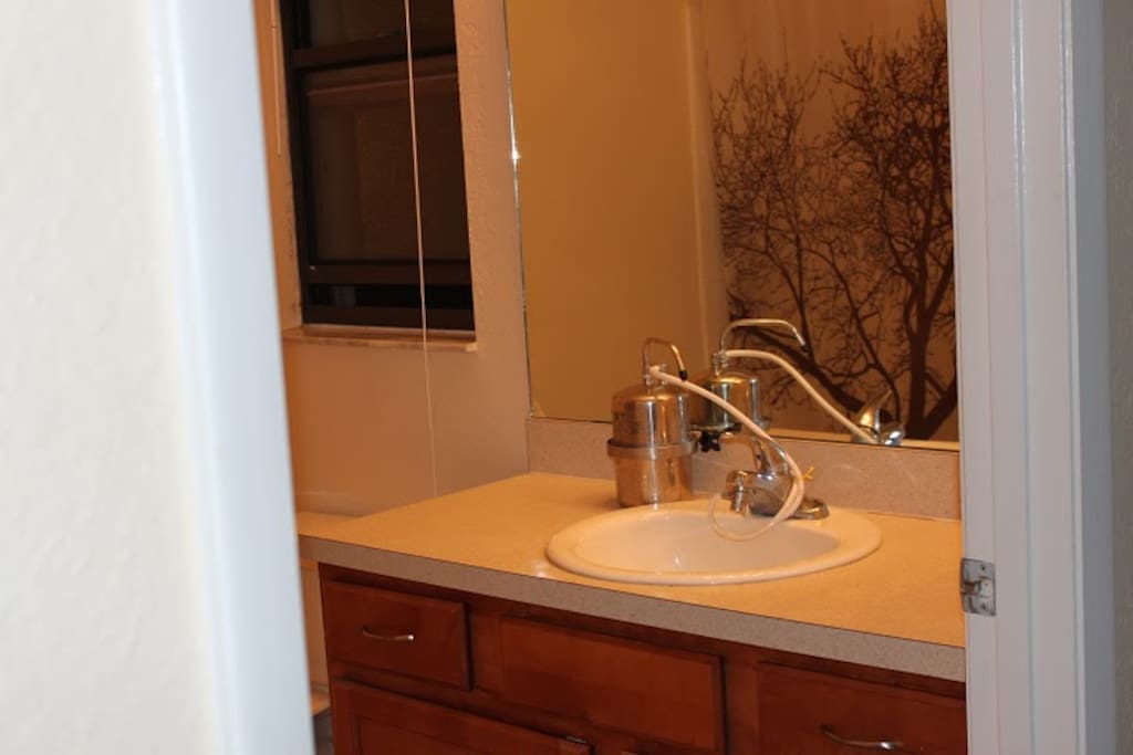 Shared bathroom, includes shampoo, conditioner, soap, towels.