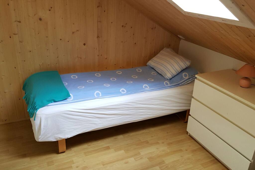 slanted ceiling in the room.