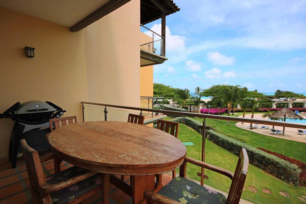 The main balcony with 6-seat dinning table & BBQ-grill