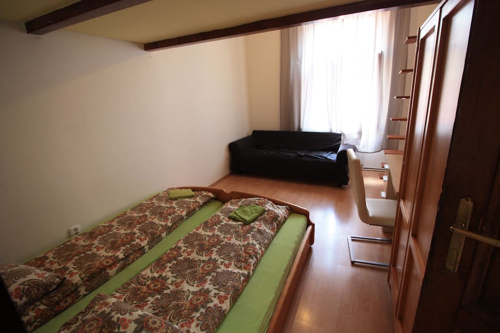 private bedroom for 4 persons , 2 beds down and 2 beds up, writing desk , wardrobe and settee