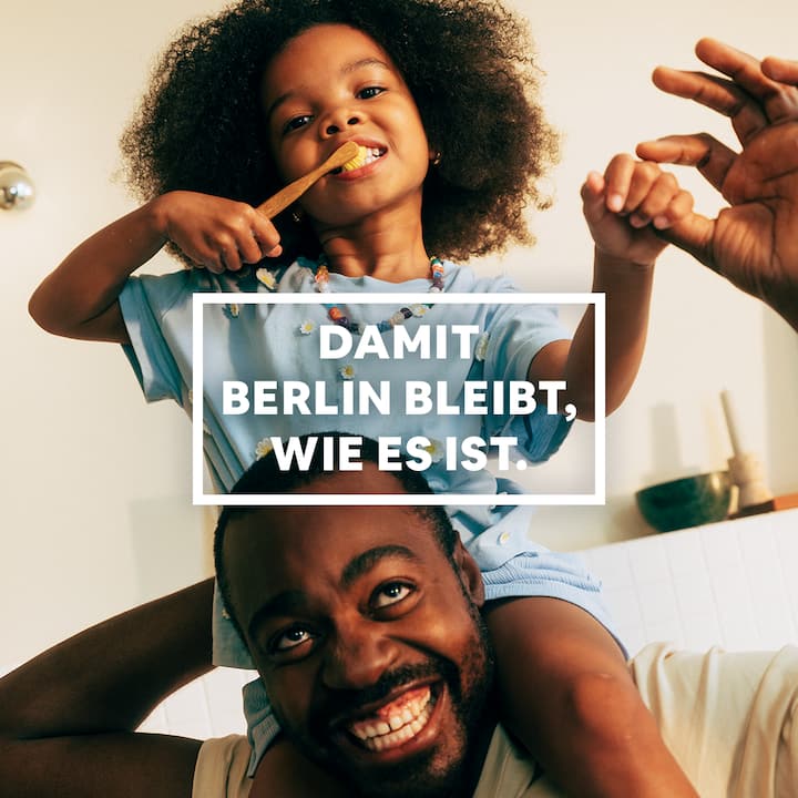 photo of child on man's shoulder brushing teeth with text over it