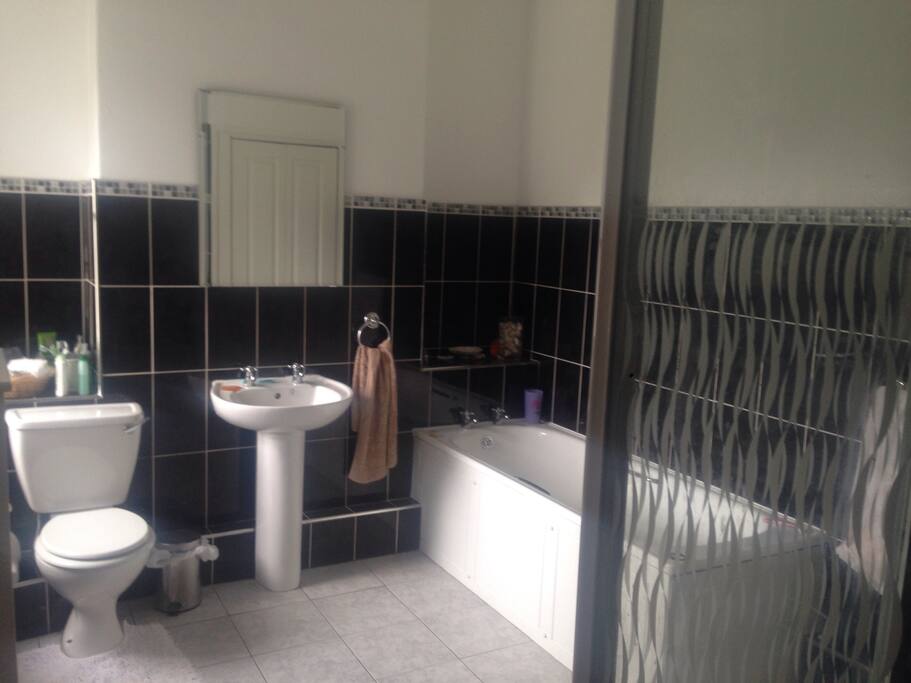 Large bathroom ( bath and shower)