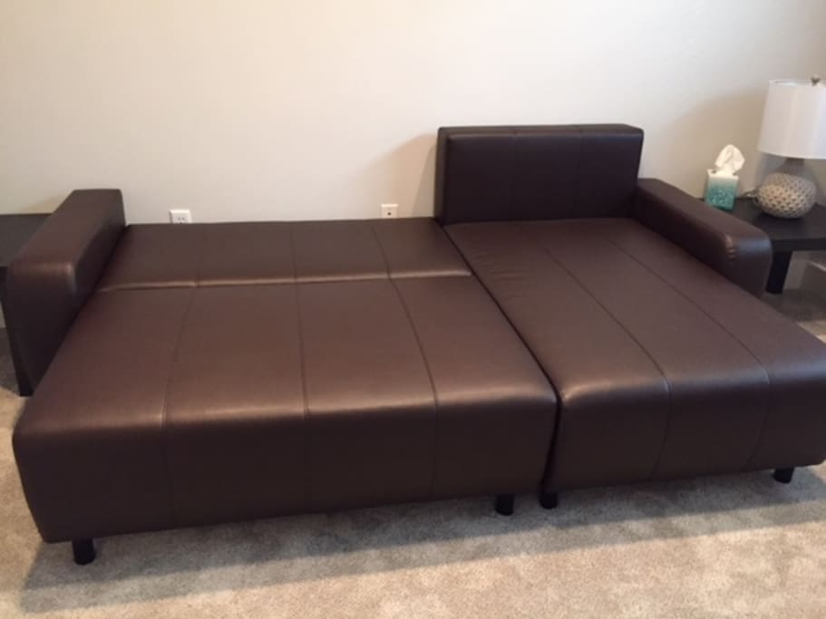 The bed comfortably sleeps two when expanded.