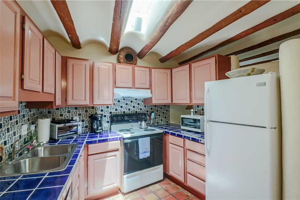 The Kitchen Has It All - From full-size fridge/freezer and oven/stove top cookware to tableware, the kitchen has everything you n