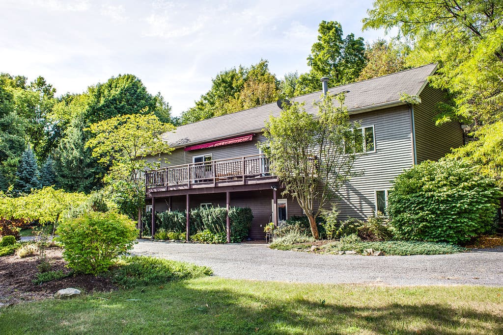 Minutes to town yet tucked into private wooded area.