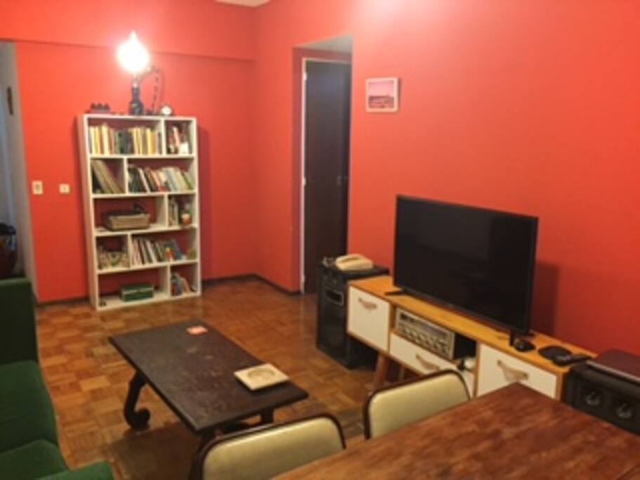 A lot of room. Big sofa chairs, a big table for eating or working and a small one