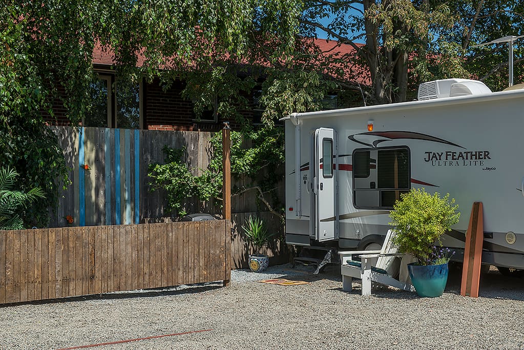 Parking space for this Bungalow is the parking space to the left, next to the fence. One car only please.
