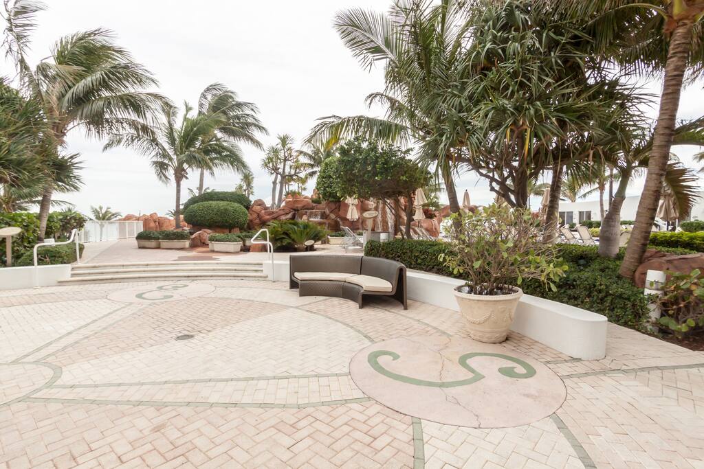 Enjoy the scenery and the breeze in the surrounding area by the outside pool.