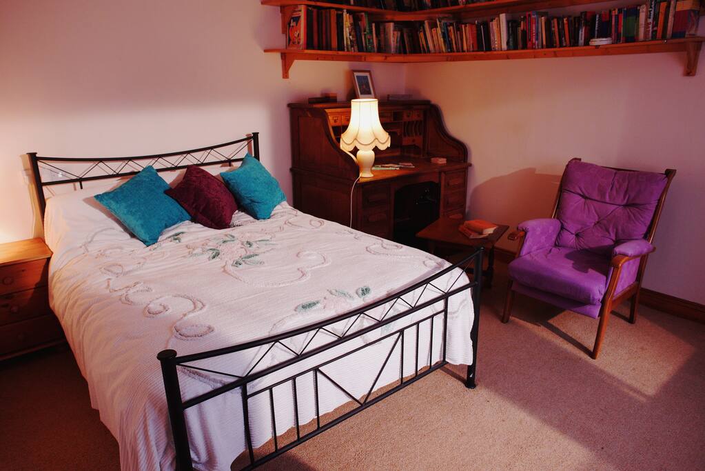 Bedroom with desk and chair