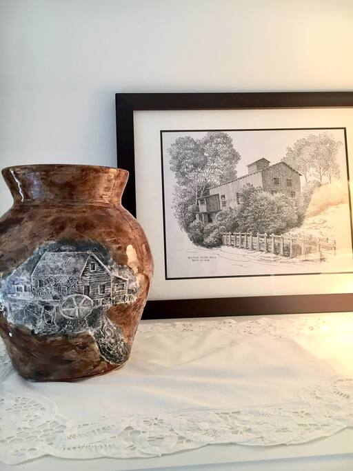 Decor includes local artwork and pottery.