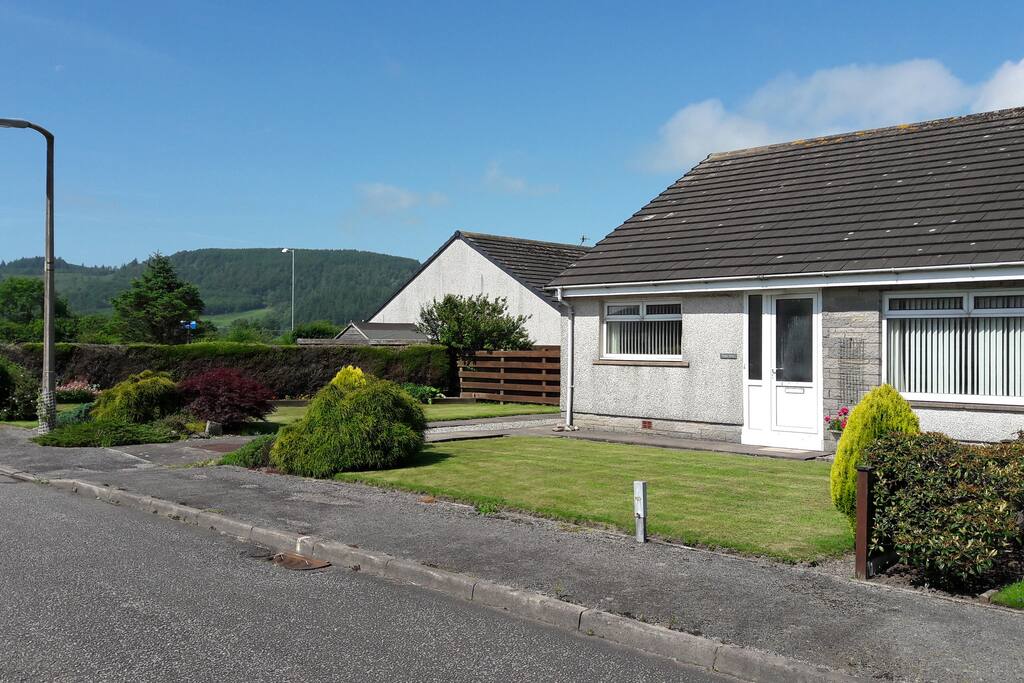 Sunny open aspect surrounded by pleasant level gardens