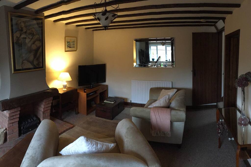 Comfortable Lounge, with SKY TV, Sonos sound speaker, large flatscreen TV, Gas Fire, Dining Table with 3 chairs