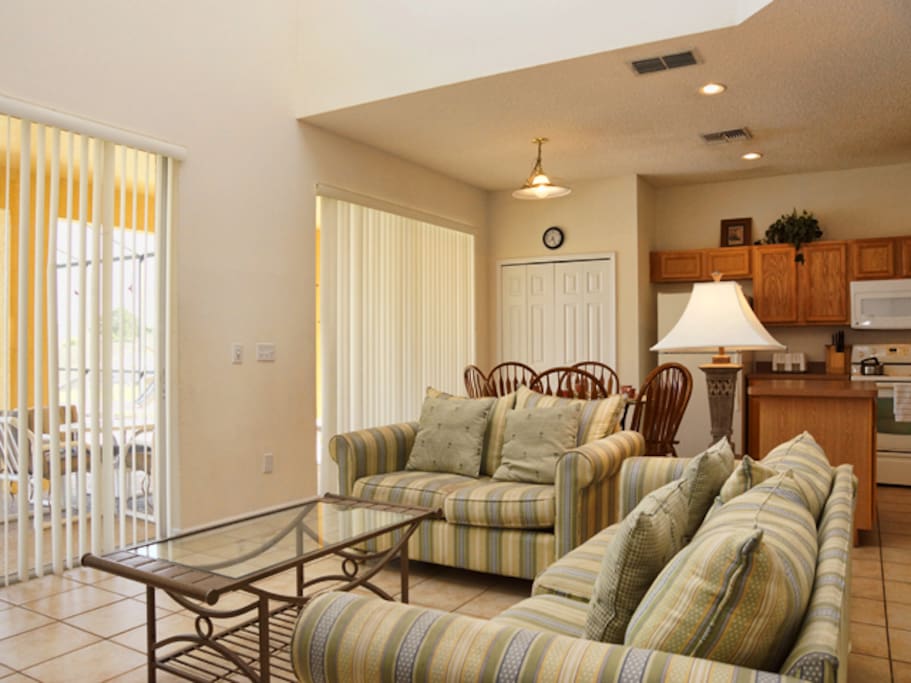 main family room leading to the private pool area.