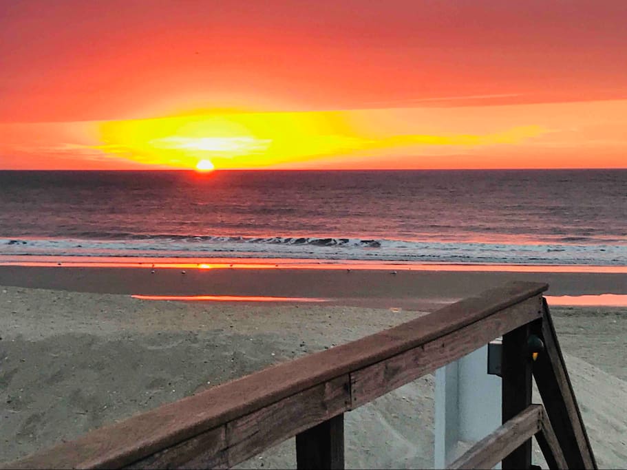 Watch the sunrise from your balcony or take a few steps down to the beach!